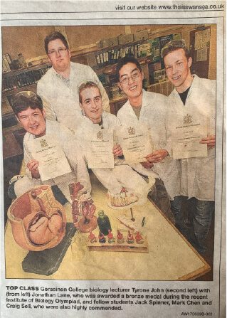 Newspaper article showing Tyrone John with Gower College Swansea students who won medals in the British Biology Olympiad